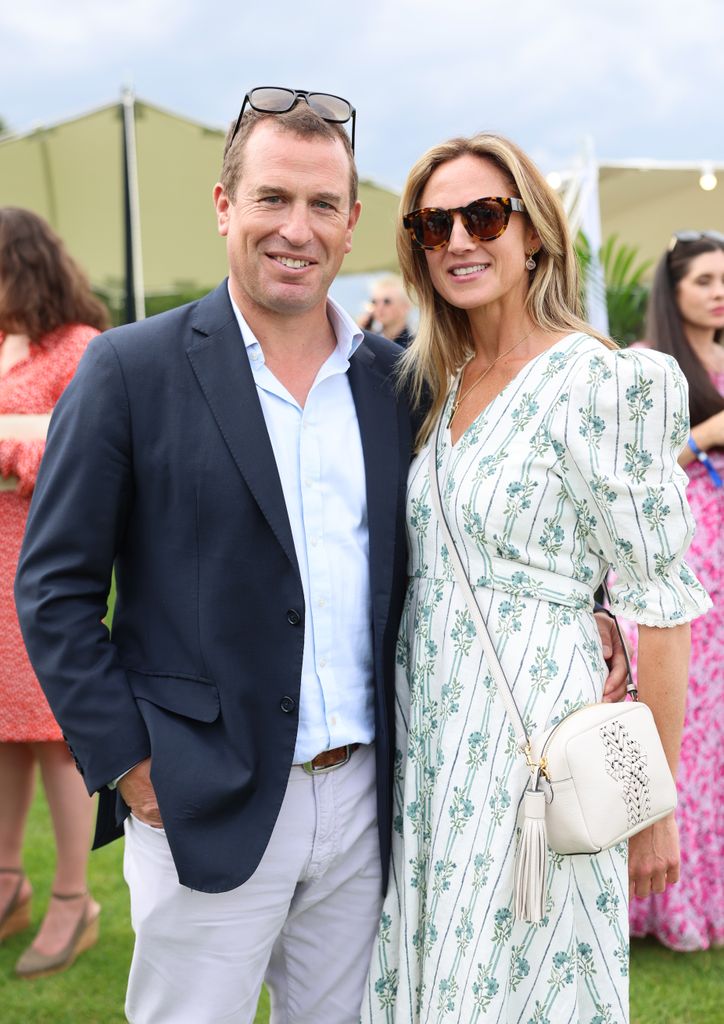 Peter Phillips and Harriet Sperling smile for camera 