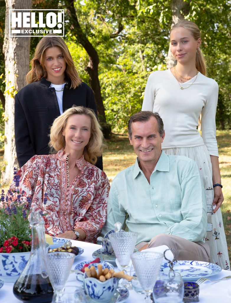 Count and Countess Lepic posing outside al fresco with daughters