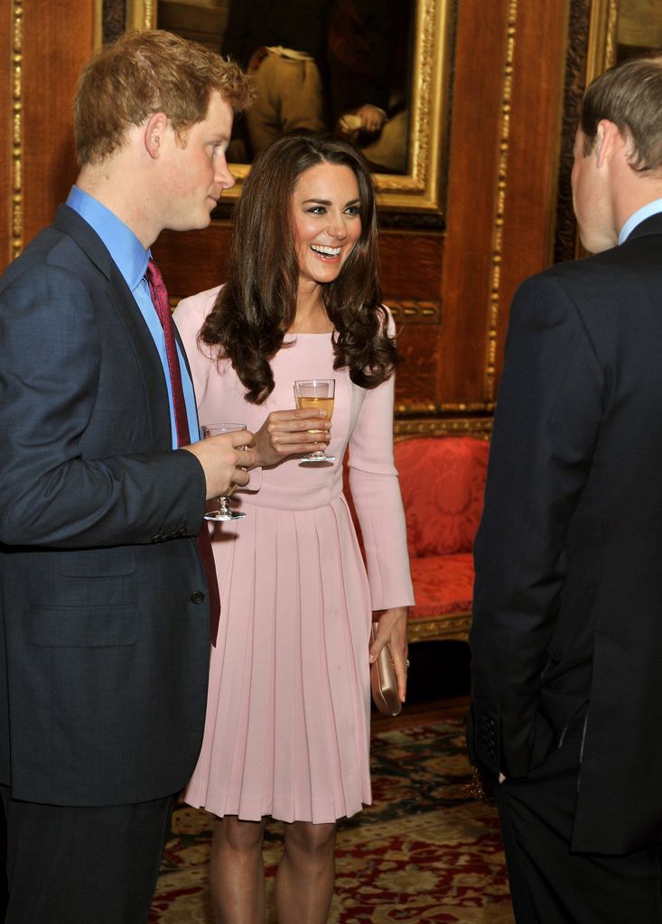 Prince William, Duke of Cambridge, Catherine, Duchess of Cambridge and Prince Harry chat during a pre luncheon reception for Queen Elizabeth's Diamond Jubilee 