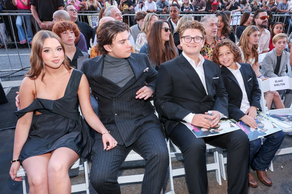 Kingston Rossdale, Zuma Rossdale and Apollo Rossdale with a guest (left) at the star ceremony where Gwen Stefani is honored with a star on the Hollywood Walk of Fame in Los Angeles, California on October 19, 2023