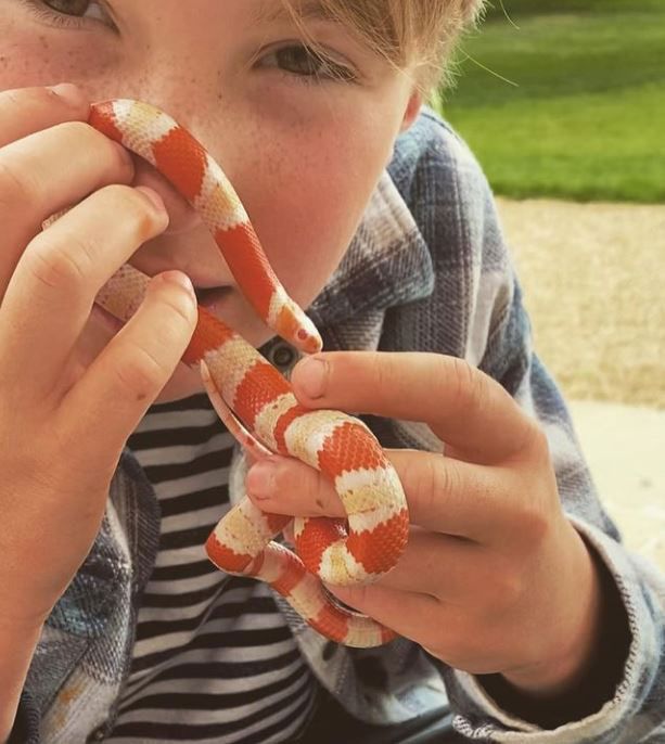 buddy oliver with pet snake