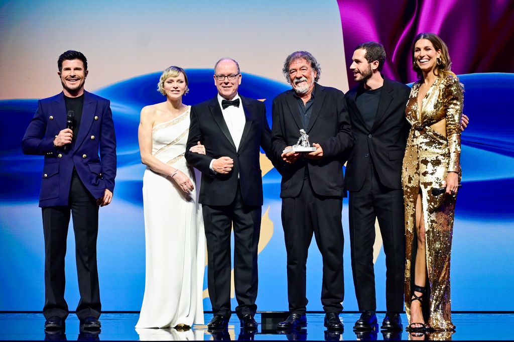 Vincent Niclo, Charlene, Princess of Monaco, Albert II, Prince of Monaco, Olivier Marchal, Victor Belmondo and Laury Thilleman appeared on stage