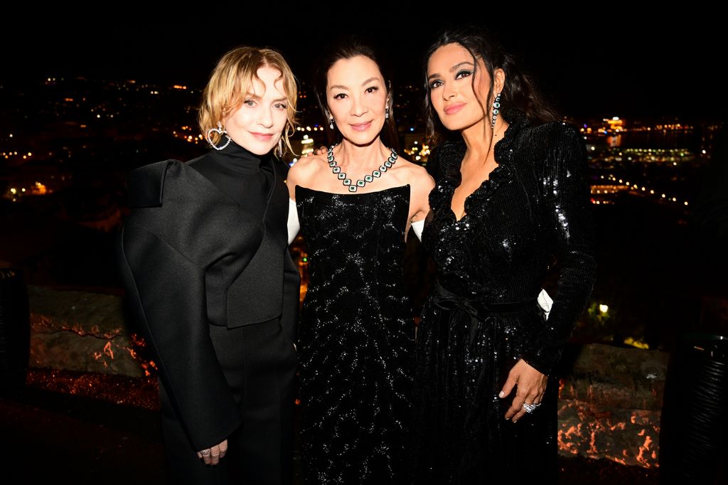 Isabelle Huppert, Michelle Yeoh, and Salma at the Kering Women In Motion Awards at the 76th Cannes Film Festival