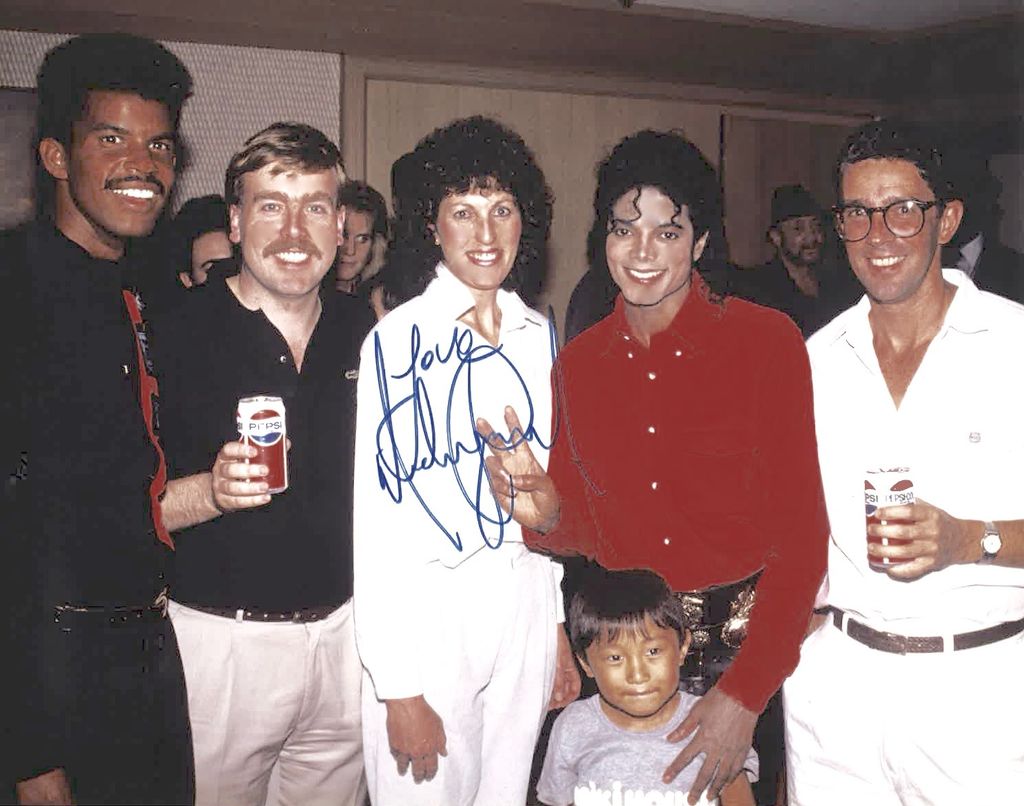 Aaron (left) with Michael Jackson (second to the right)