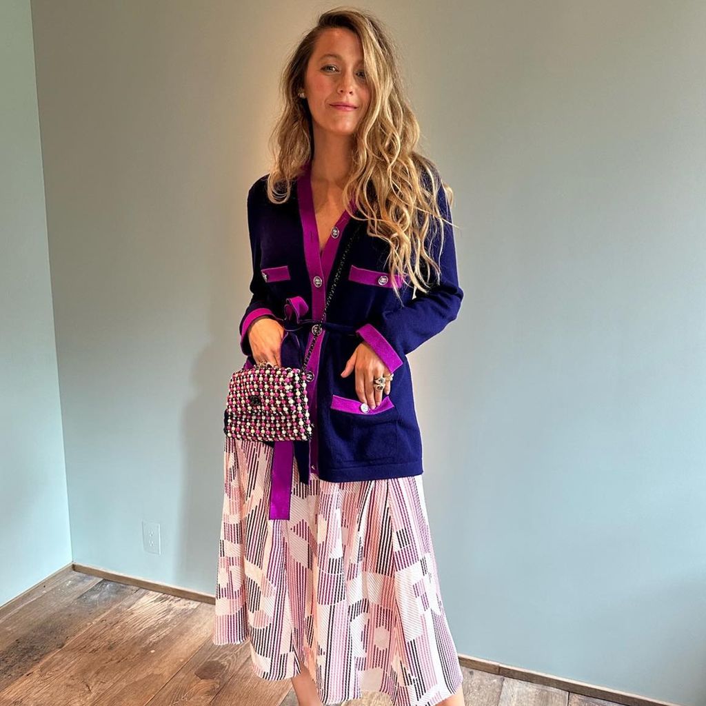 Blake Lively in a pink and purple outfit