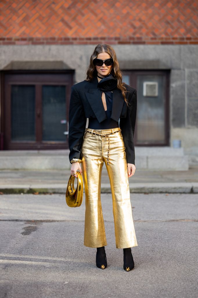 Nina Sandbech wearing a gold Coperni Swipe Bag