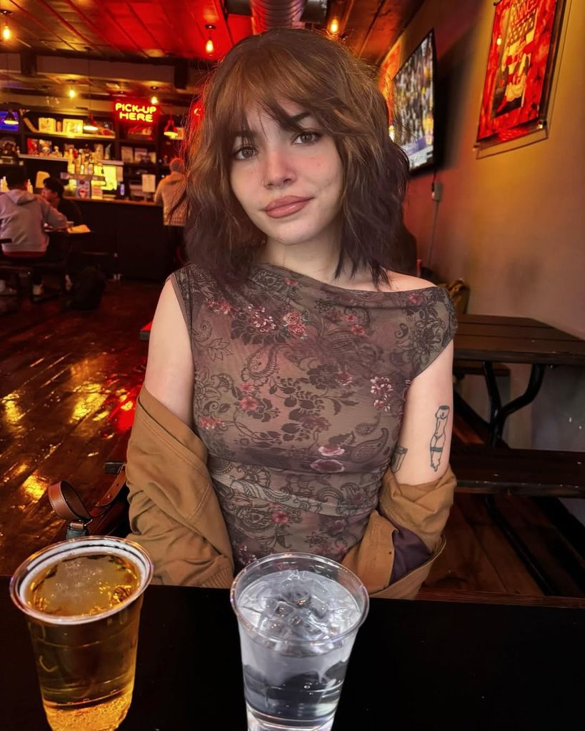 Lexi Jones eating at pub