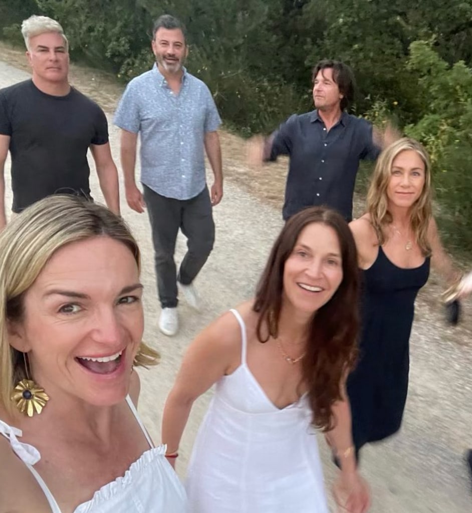 Photo shared by Jennifer Aniston on Instagram September 2023 where she is pictured alongside Jimmy Kimmel, Molly McNearney, Jason Bateman, Amanda Anka, and Will Speck during a vacation to the beach