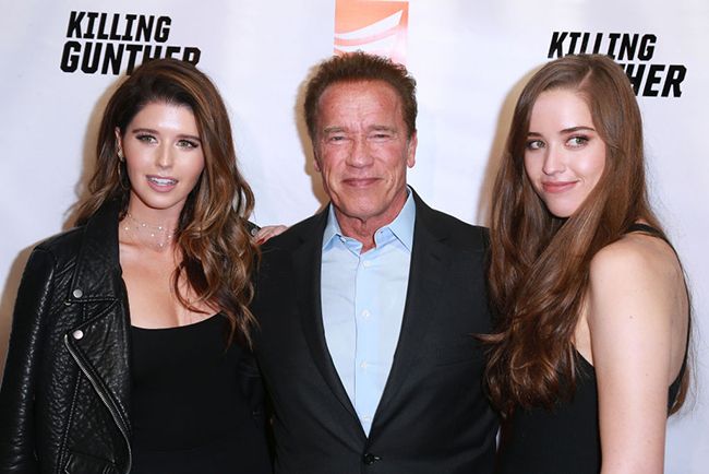 Arnold Schwarzenegger with his two daughters, Katherine and Christina. 