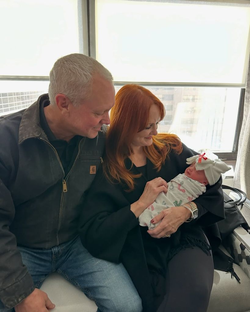 Ree and Ladd Drummond hold their granddaughter Sofia Scott for the first time, shared in an Instagram photo