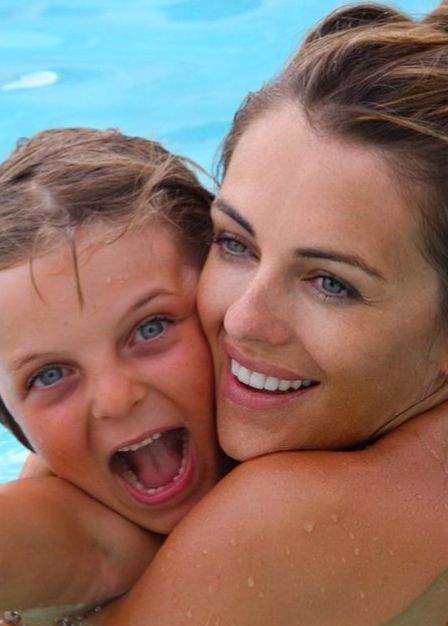 Elizabeth Hurley and Damian in a swimming pool