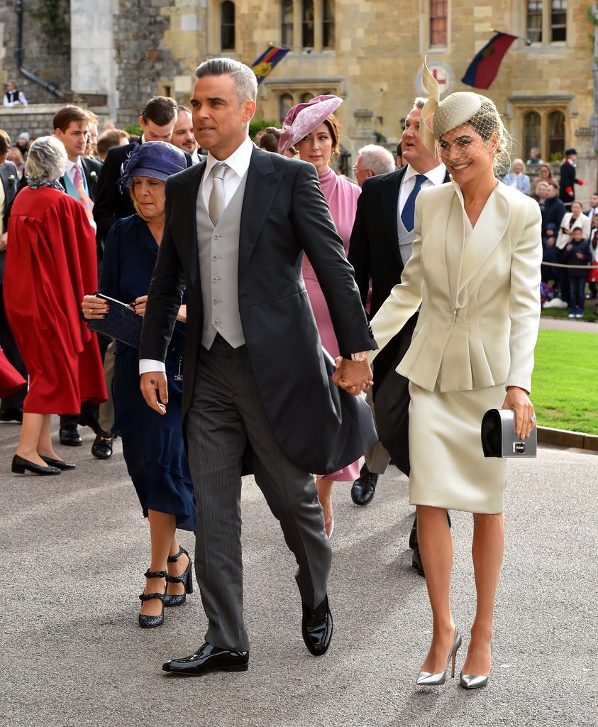 Gwen Field, Robbie Williams and Ayda Field arrive for the wedding of Princess Eugenie and Jack Brooksbank