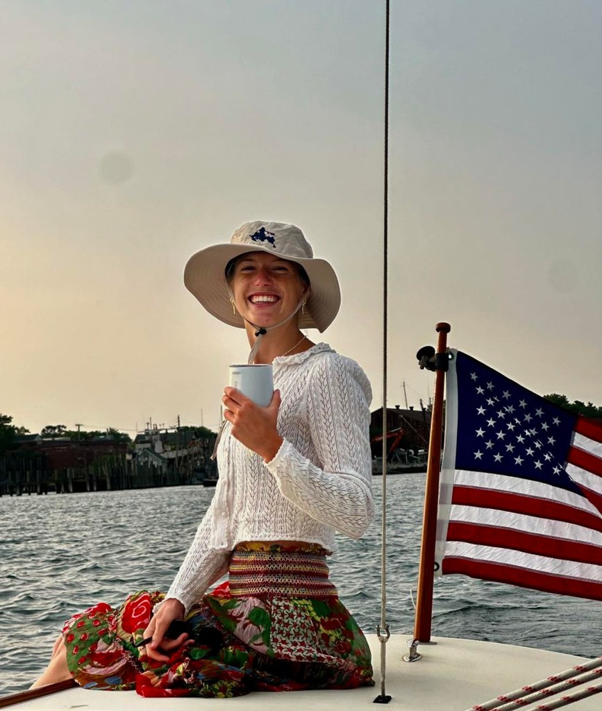 Photo shared by Tim McGraw on Instagram August 2025 of his daughter Maggie on a boat in honor of her 25th birthday