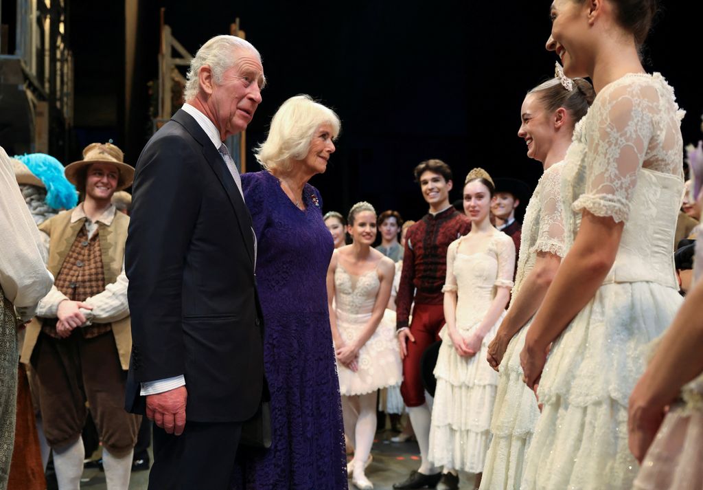 King and Queen speak with royal ballet dancers backstage