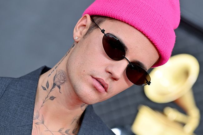 Justin Bieber in pink beanie hat