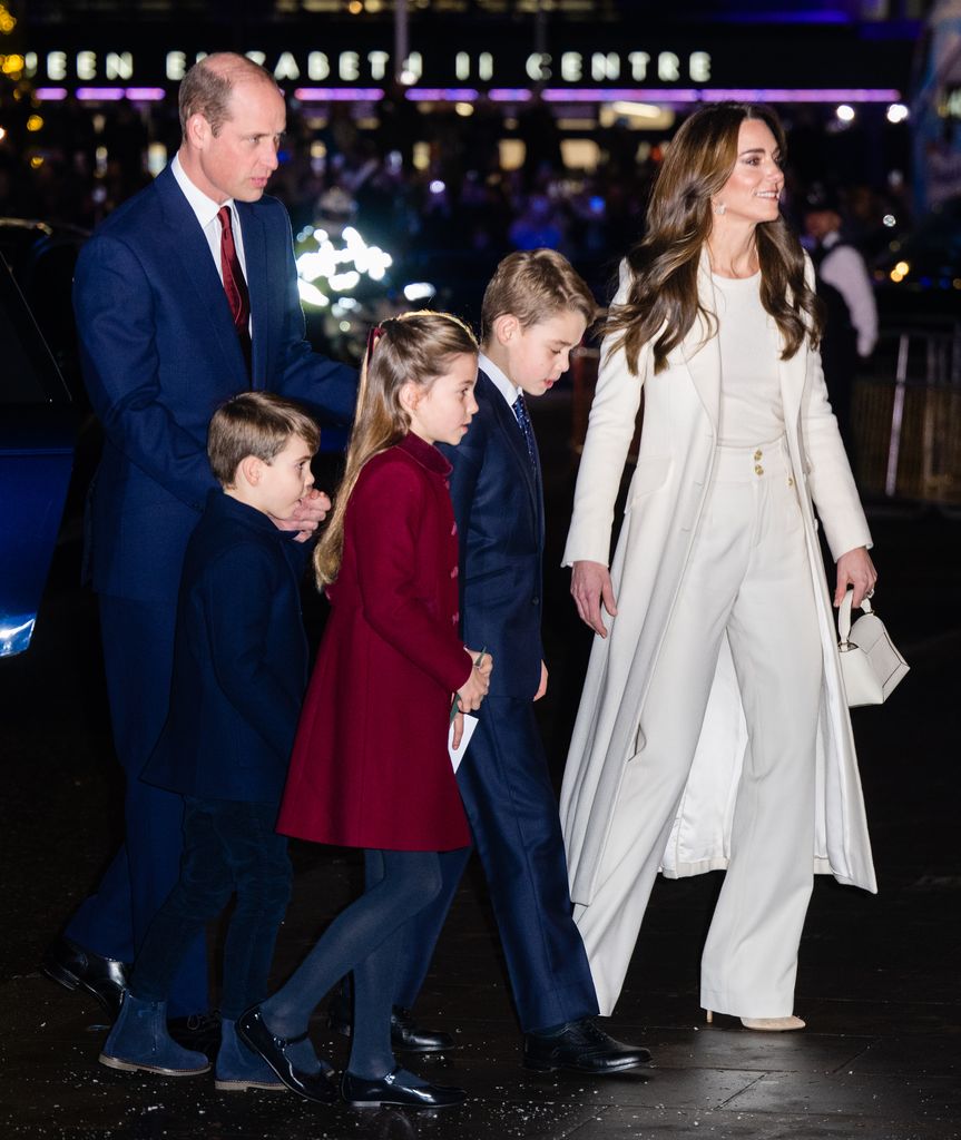 Prince William, Kate, george, charlotte, and louis approach westminster abbey