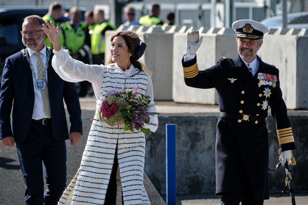 Queen Mary teamed her nautical cardigan with a white cotton-voile blouse