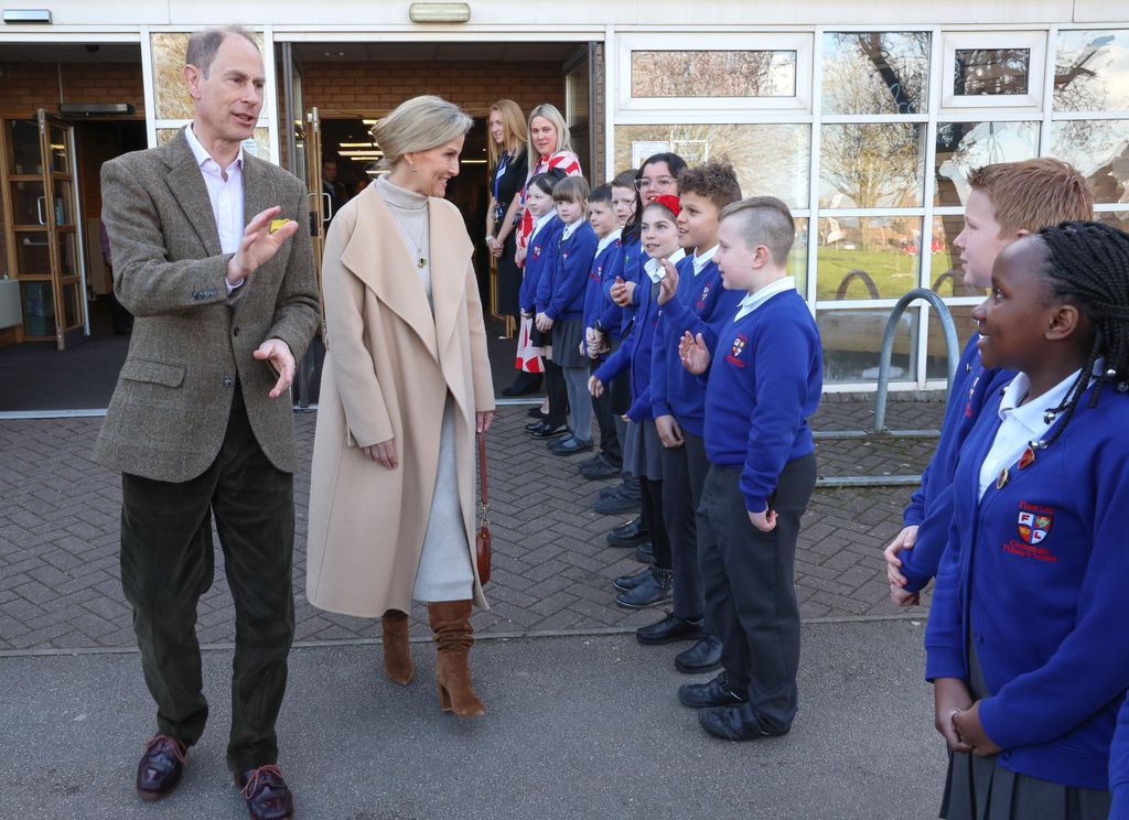Prince Edward and Sophie, Duchess of Edinburgh greeting school children