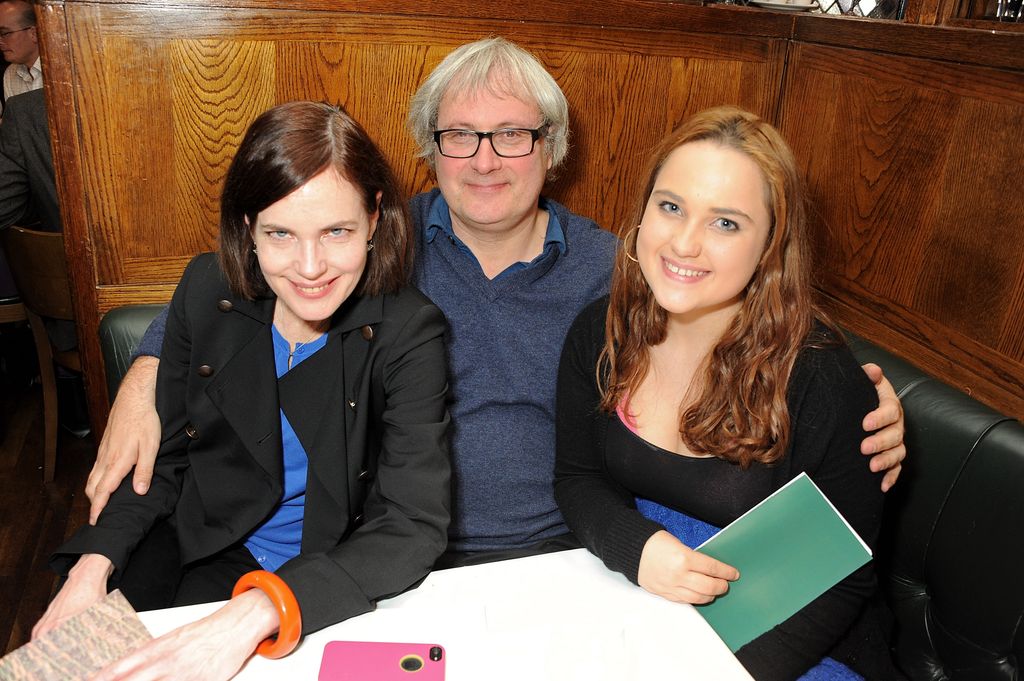 Elizabeth with her husband and daughter 