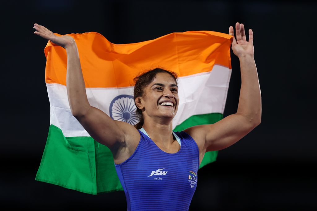 Vinesh Phogat of Team India celebrates after defeating Chamodya Keshani Maduravalage Don of Team Sri Lanka during the Women's Wrestling Freestyle 53 kg Nordic match on day nine of the Birmingham 2022 Commonwealth Games at Coventry Arena on August 06, 2022 on the Coventry, England.