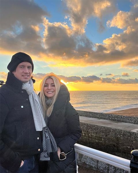 Vernon Kay and Tess Daly in front of a setting sun