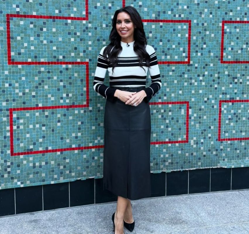 Christine Lampard in a jumper and leather skirt