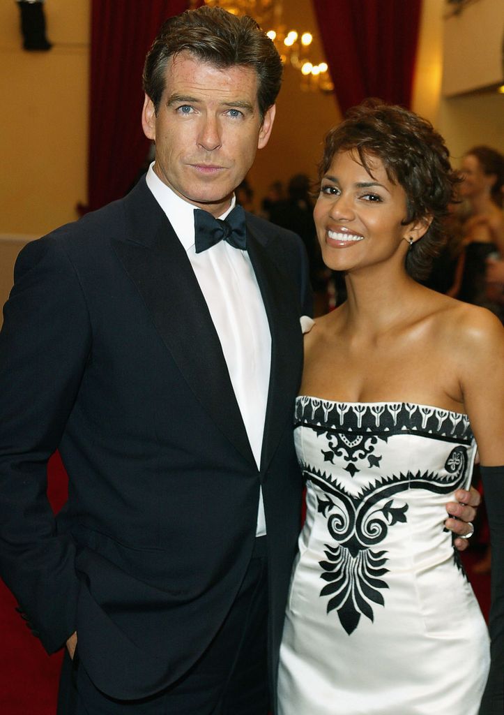 LONDON, NOVEMBER 18: (FILE PHOTO) Pierce Brosnan and Halle Berry  arrives for World Premiere of the James Bond film 'Die Another Day' attended by Britain's Queen Elizabeth II, at the Royal Albert Hall on November 18, 2002 in London, England. (Photo by Anwar Hussein/Getty Images)