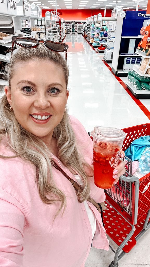 Woman holding an ice drink in the supermarket