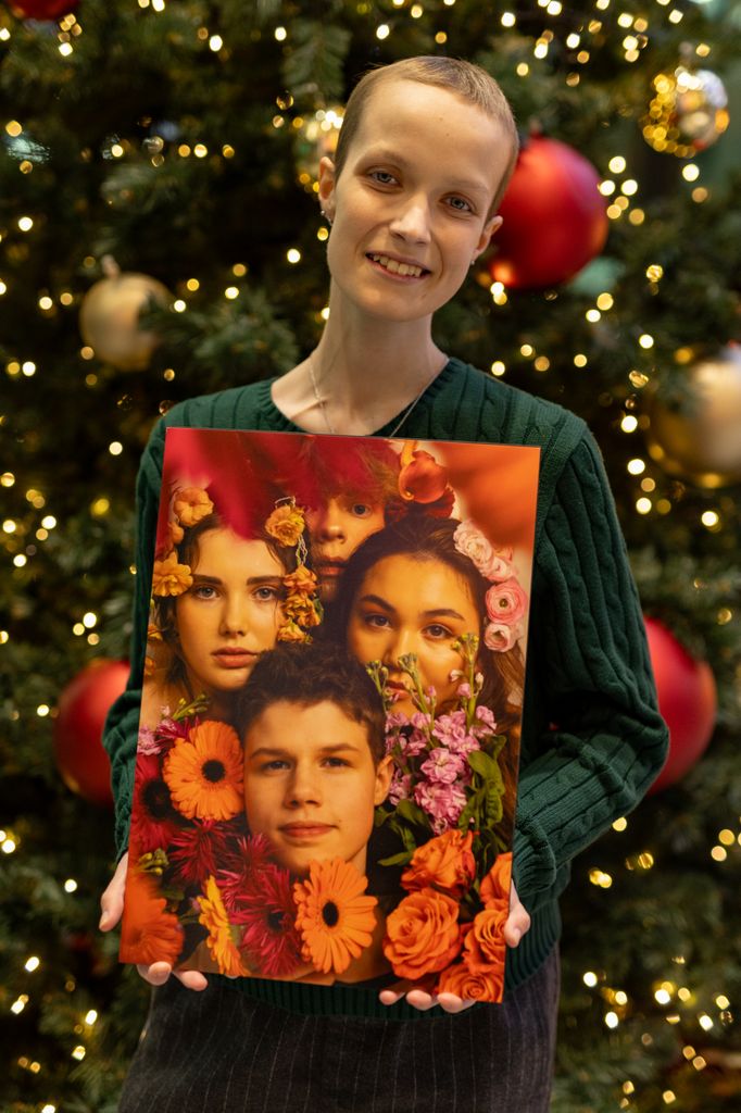 Liz Hatton holding a photograph