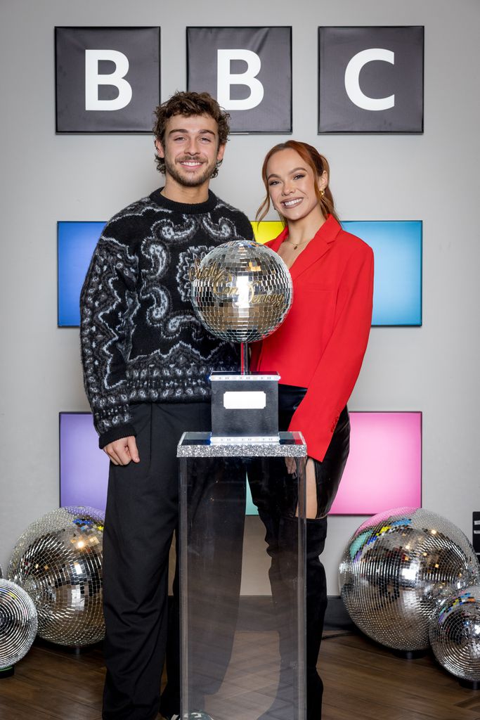 George Clarke and Alexis Warr with the Glitterball trophy