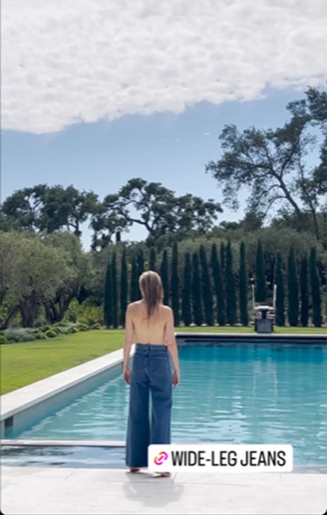Gwyneth Paltrow poses topless by her poolside