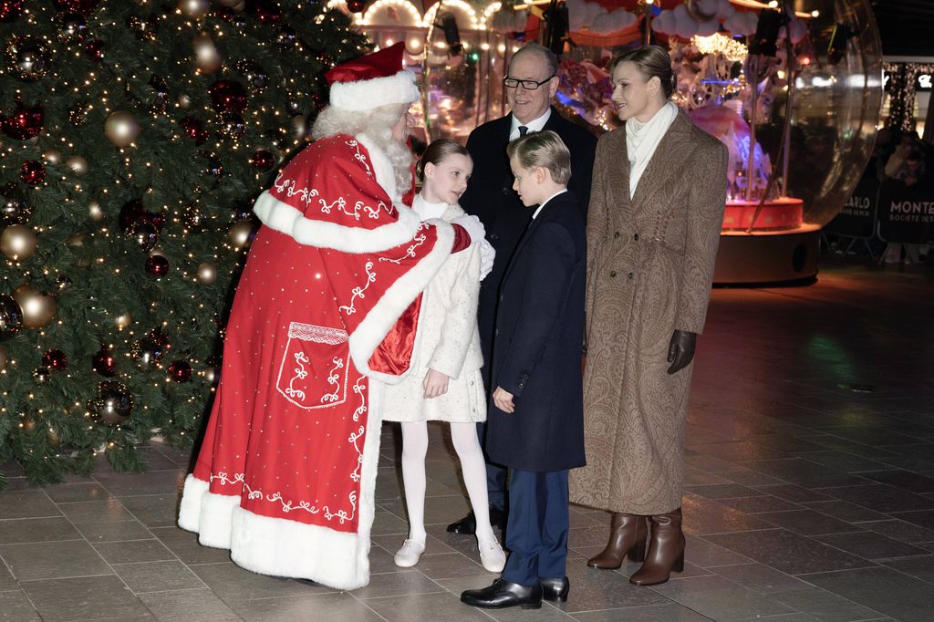 monaco prince and princess with son and daughter greeting santa
