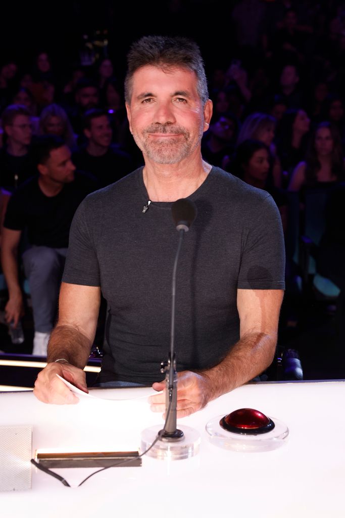 Simon Cowell in a black to on AGT