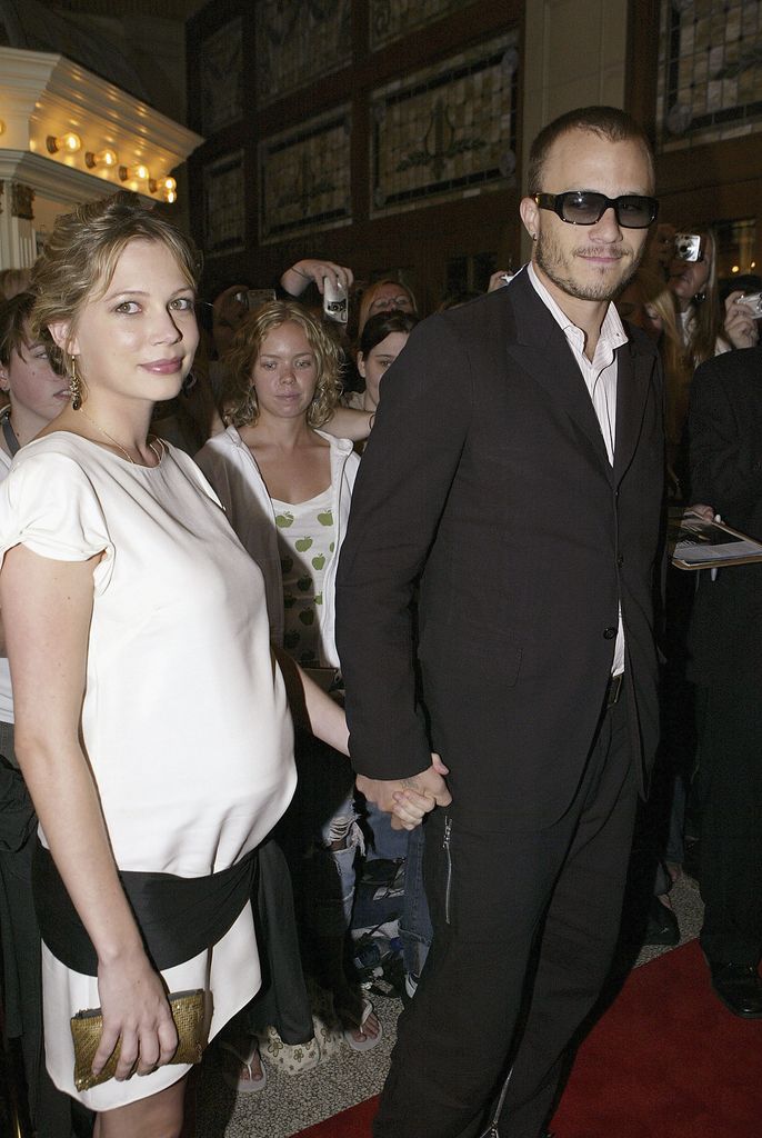 Heath Ledger and Michelle Williams arrive on the red carpet during the arrivals for the TIFF premiere screening of 'Brokeback Mountain' on September 10, 2005 in Toronto, Canada