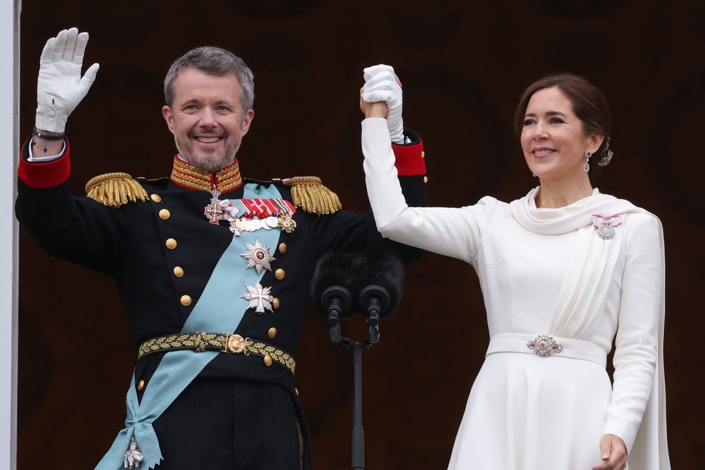 Queen Mary and King Frederik wave to crowds after proclamation