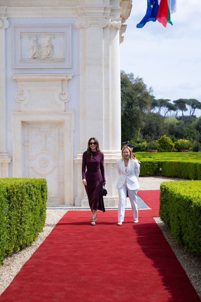 two women walking down red carpet