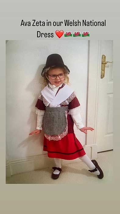 Catherine Zeta Jones neice Ava posing for a photo in traditional Welsh dress