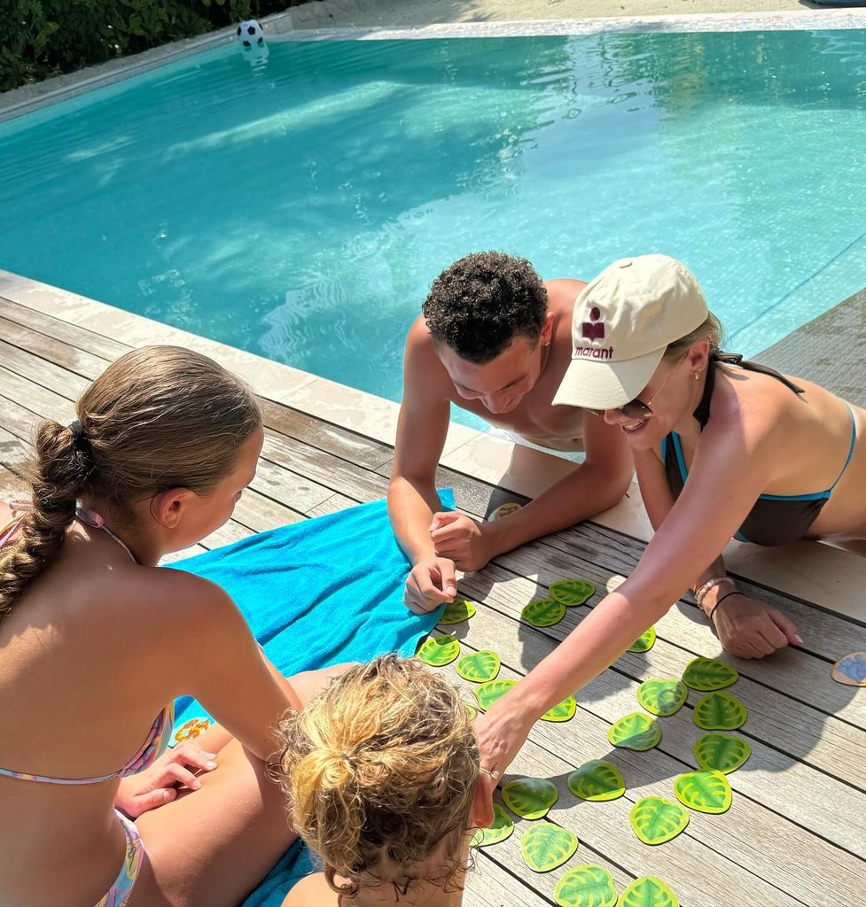 kids playing game by pool