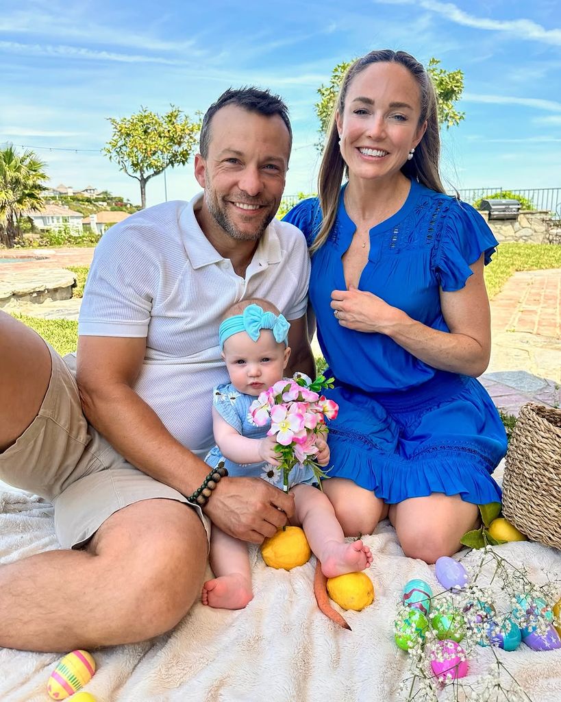 Kyle Schmid and Caity Lotz with their baby girl on Easter Sunday 2025