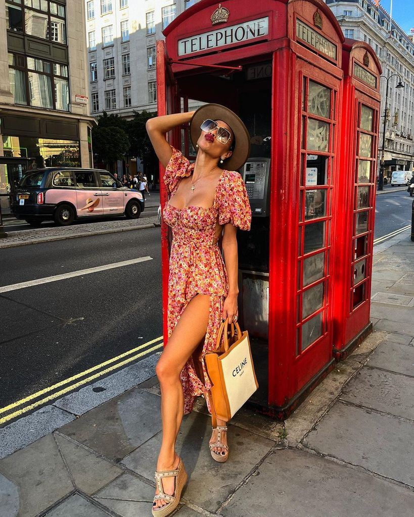 Nicole Scherzinger posing in front of a London telephone booth in a photo shared on Instagram