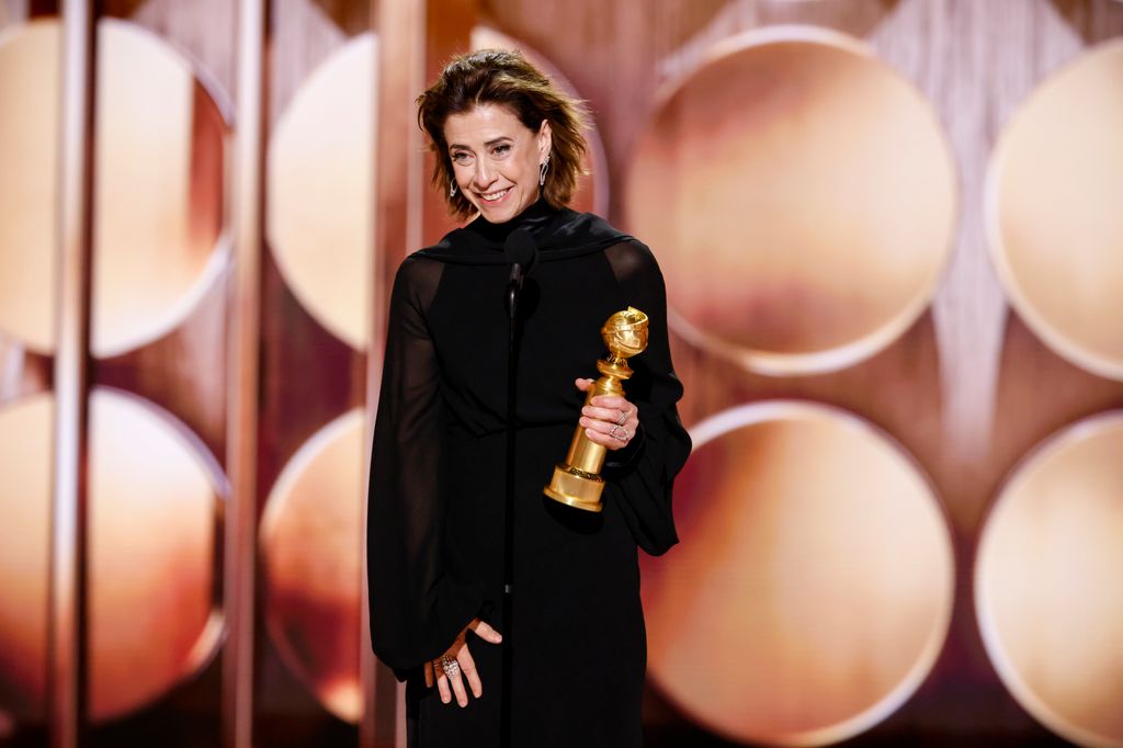 Fernanda Torres accepts the award for Female Actor - Motion Picture - Drama at the 82nd Annual Golden Globe Awards at The Beverly Hilton on January 05, 2025 in Beverly Hills, California.