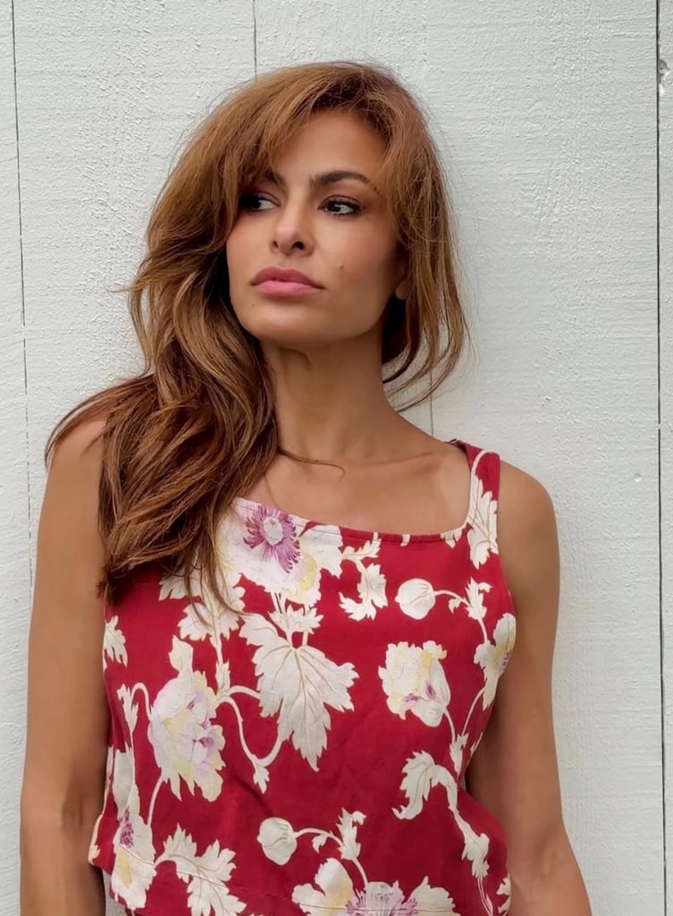 Photo shared by Eva Mendes on Instagram memorial Day Weekend 2025 of herself in a red floral dress