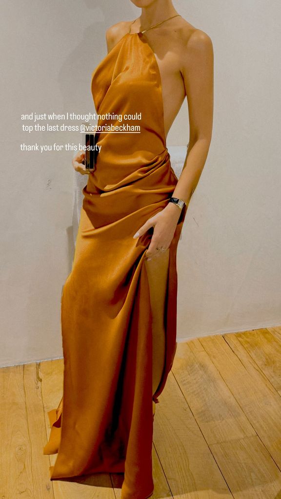 A photograph of an orange dress