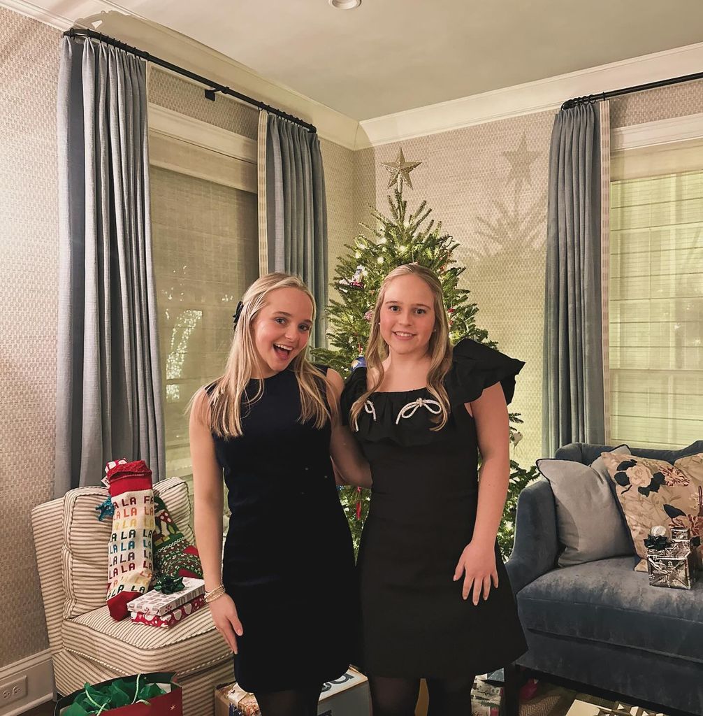 Reese Witherspoon's nieces in front of a Christmas tree