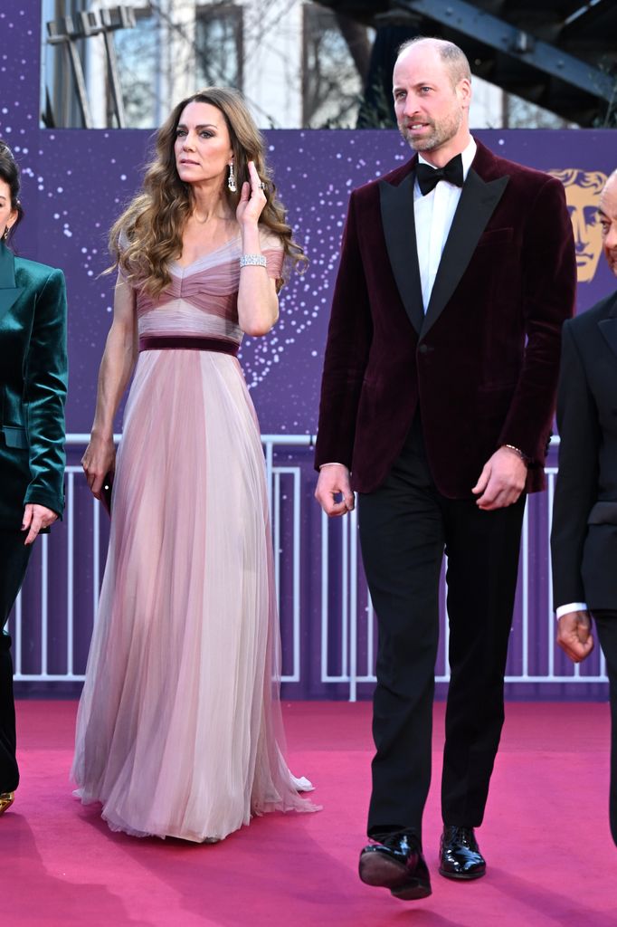 The Princess of Wales in her floaty mauve dress beside William in burgundy suit