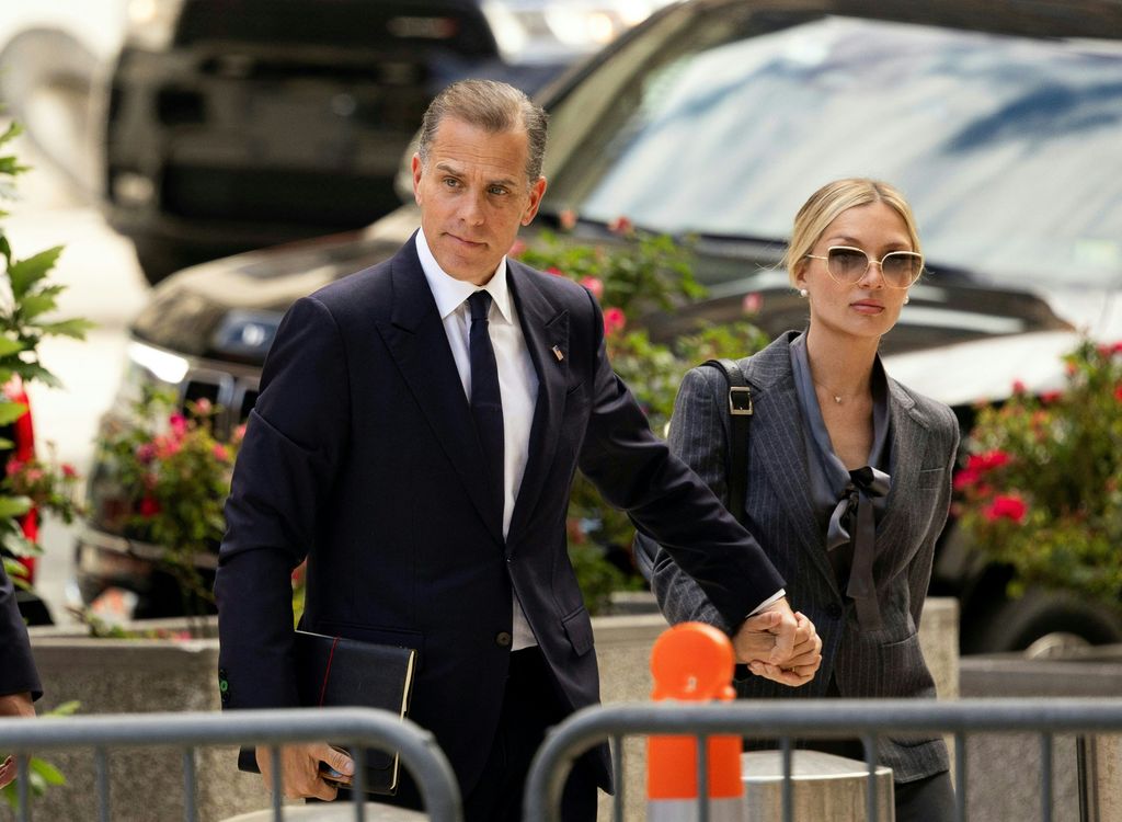 Hunter Biden, son of US President Joe Biden, joined by his wife Melissa Cohen Biden, arrives to the J. Caleb Boggs Federal Building on June 3, 2024 in Wilmington, Delaware. Joe Biden's son Hunter goes on trial June 3, 2024 on gun charges, the first prosecution in US history for the child of a sitting president. The 54-year-old denies three felony counts stemming from his purchase of a .38-caliber Colt Cobra revolver in 2018 when, by his own admission, he was heavily addicted to drugs