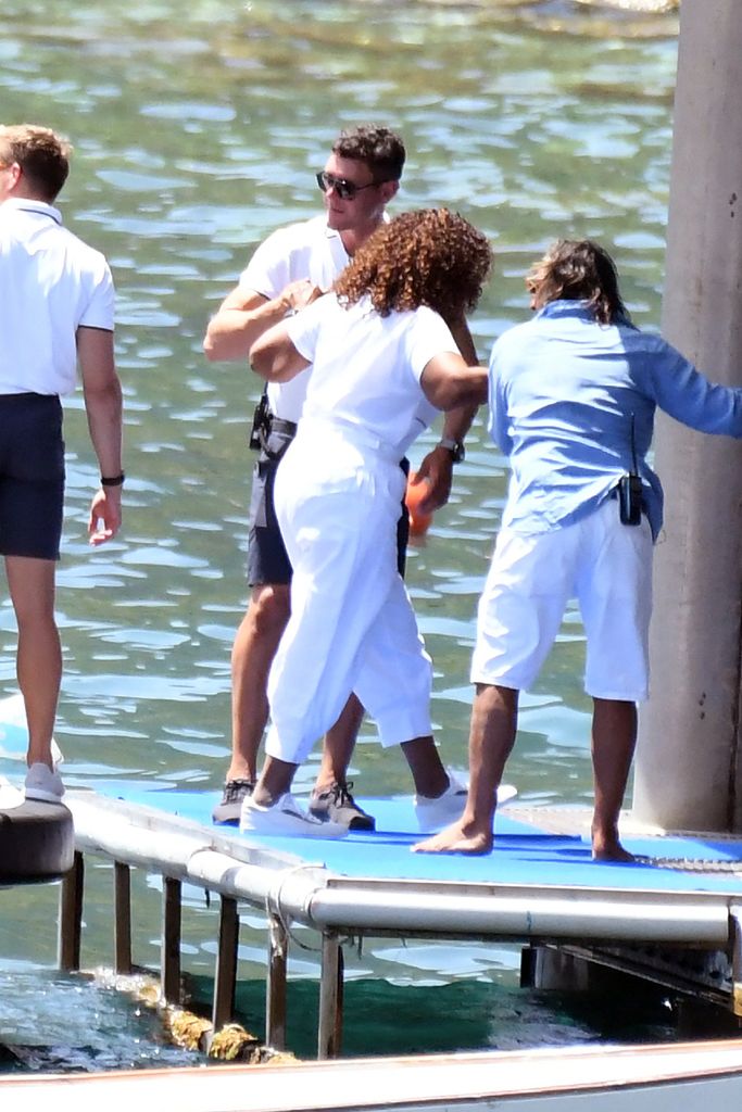 Oprah Winfrey is seen arriving at the restaurant Lo Scoglio 