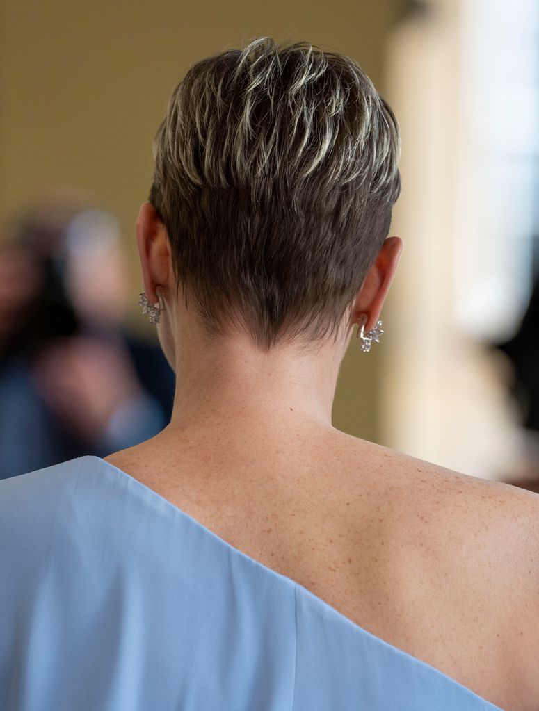 Princess Charlene's cropped hair from back