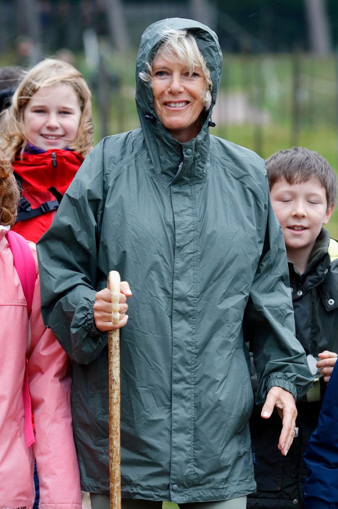 Queen Camilla walking with a stick