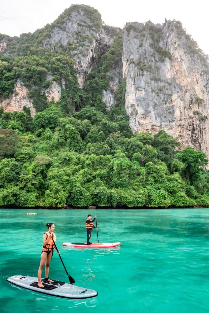 Two paddleboarders in Thailand